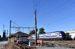 ACE Charger # 3111 shoves ACE Train # 04 past the miniscule depot, enroute from San Jose Diridon to Stockton 